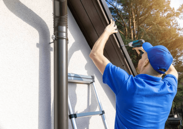 man drilling roof